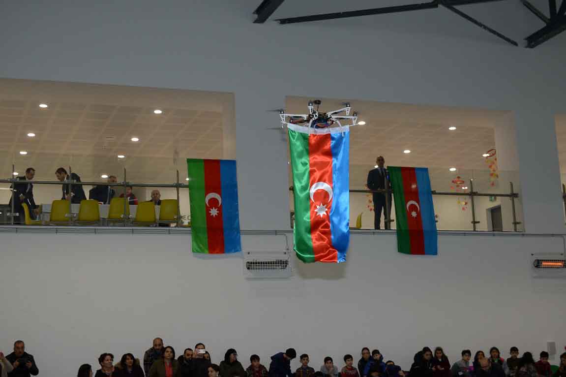 drone holding flag